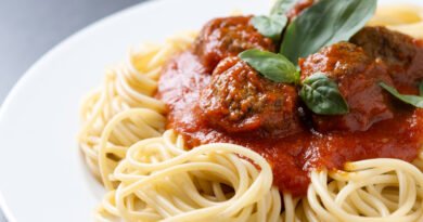 Spaghetti With Meatballs On Black Background